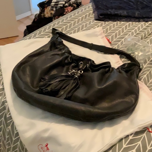 Loft leather hobo bag with tassles. - Picture 2 of 3
